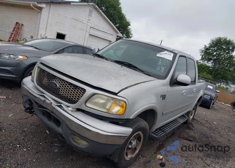 2002 Ford F-150 Lariat/Xlt z USA, uszkodzony, nr VIN 1FTRW08L62KC77375